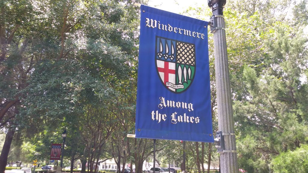Windermere Homes for sale. Among The Lakes. Town Center flag pictured
