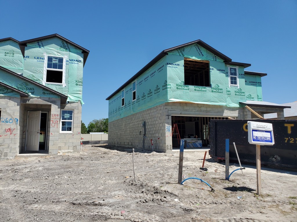 House Wrap Over OSB Board. Wood Frame over Cement Block